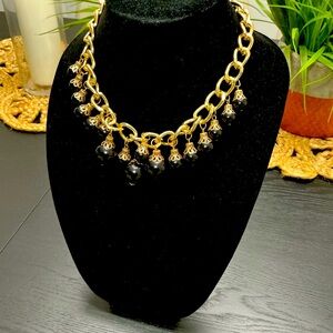 Elegant Gold and Black Necklace